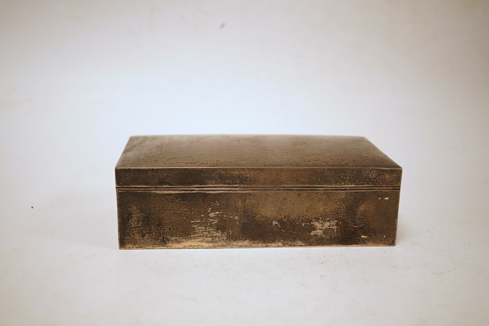A George V rectangular plain silver cigarette box, Walker & Hall, Sheffield, 1929, 17.9cm.